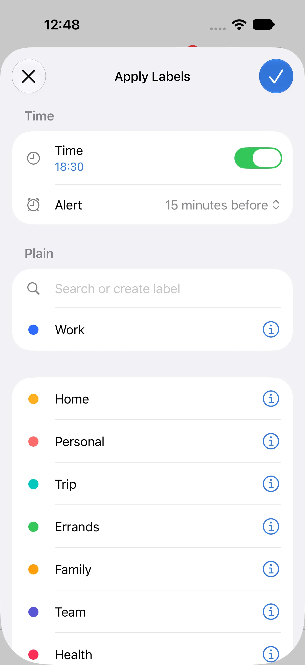 The Apply Labels screen. The Work label is selected, Time is on at 18:30, and the alert is set to 15 minutes before.